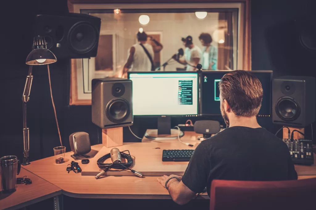 Music band during cd recording in studio